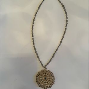 Catherine Popesco of LaVie Parisienne Necklace set in Gold, black stones